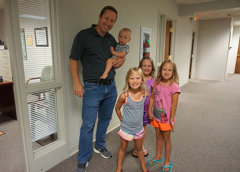 Marshall Franklin pictured with his 4 children