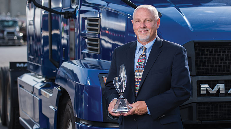 Highway Transport's Rick Lusby with Responsible Care trophy