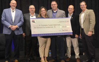 Trucker relief fund receives donation on behalf of Highway Transport driver of the year